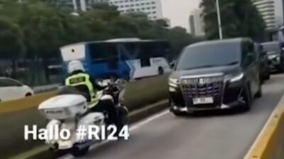 Viral Mobil Dinas Pelat RI Lewat Jalur Busway, Langgar Aturan?