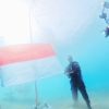 81 Penyelam Kibarkan Merah Putih di Dasar Laut Pasir Putih Situbondo
